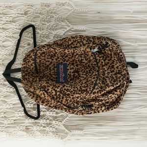 Jansport fuzzy cheetah print backpack